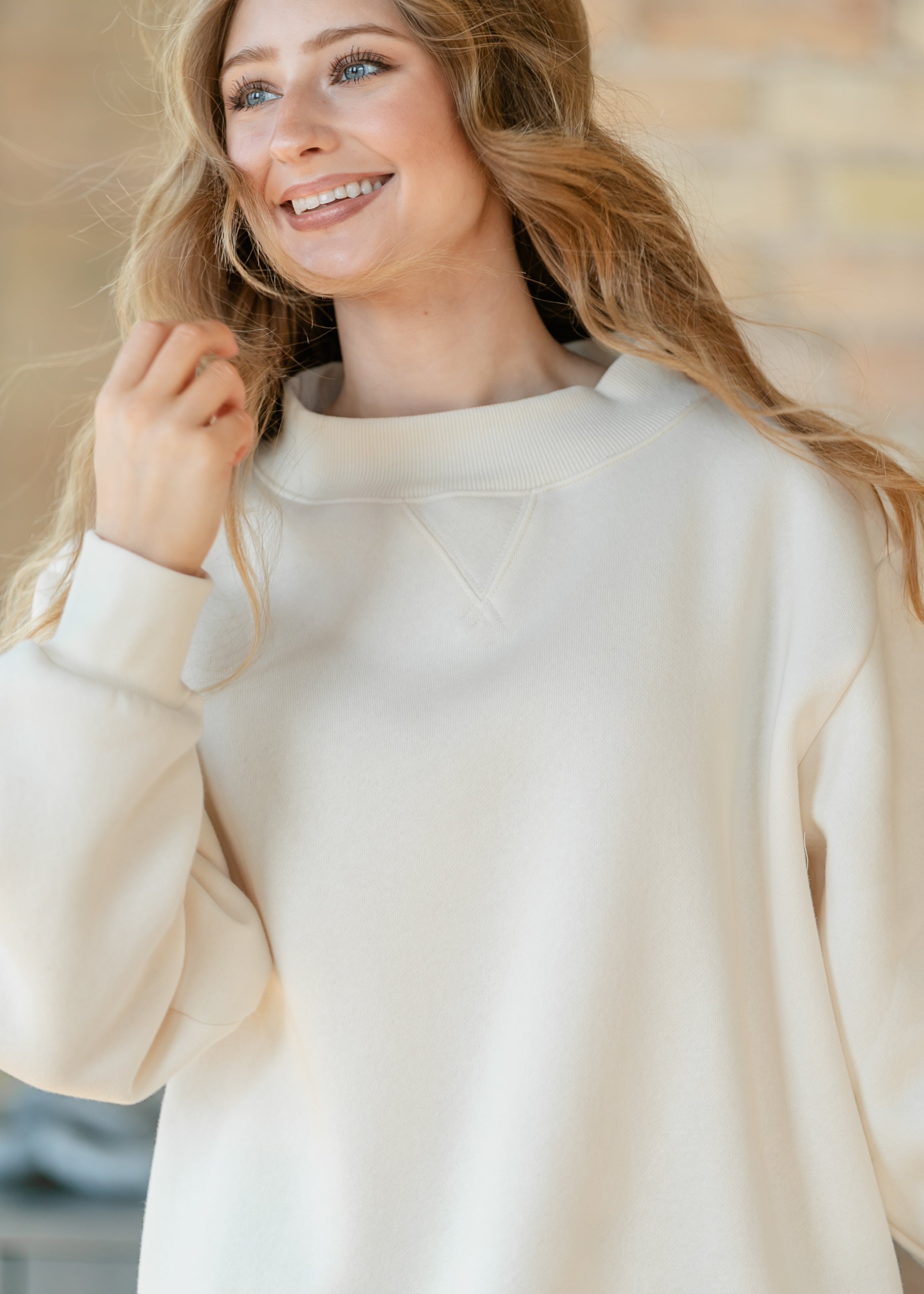 Things Between® Nelly Mock Neck Cream Sweatshirt
